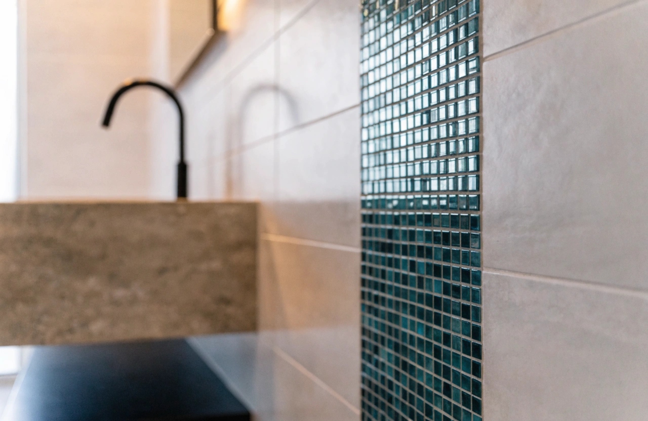 Mosaic feature wall in a renovated Wollongong bathroom