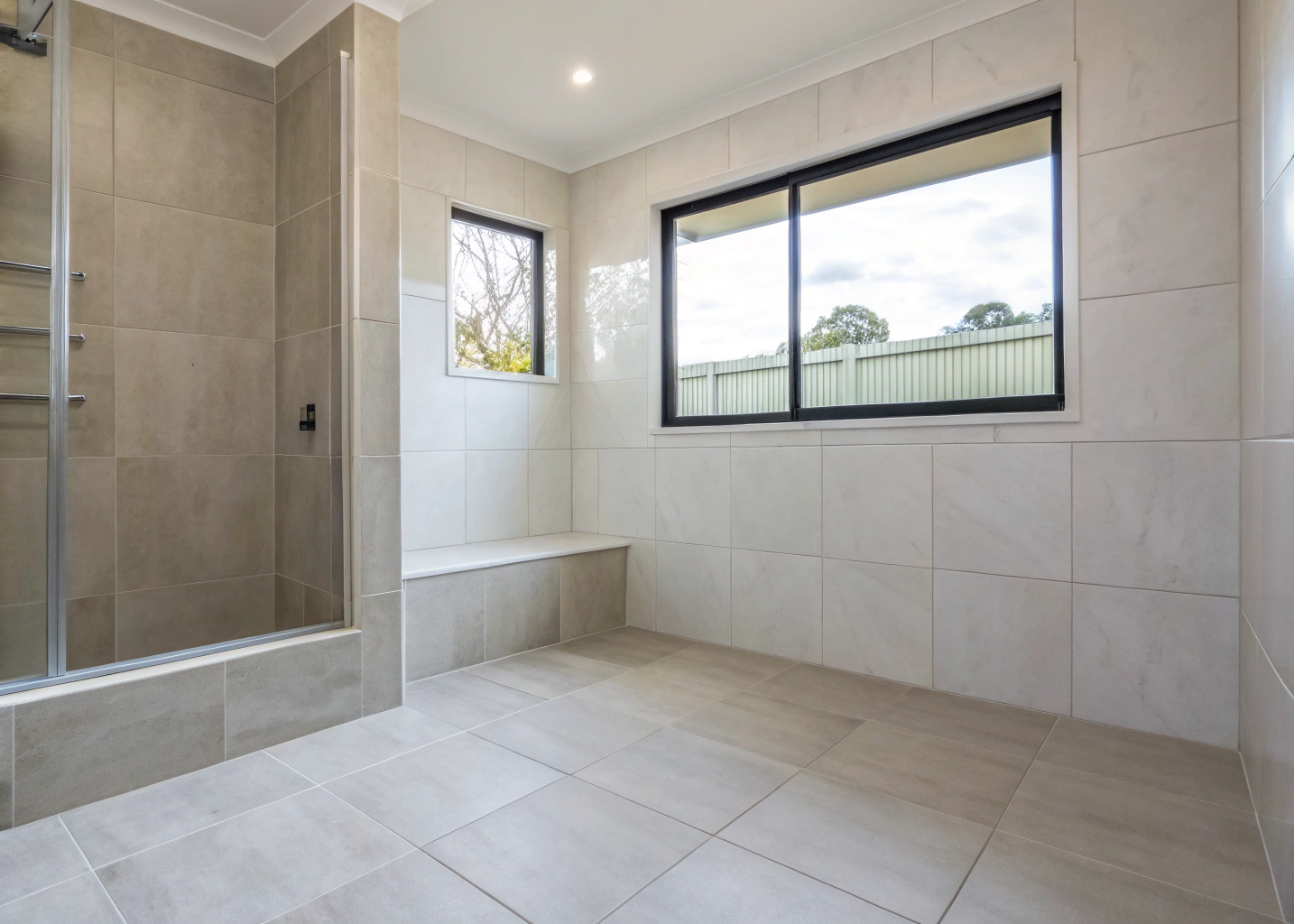Bathroom floor and wall tiling in a Wollongong home